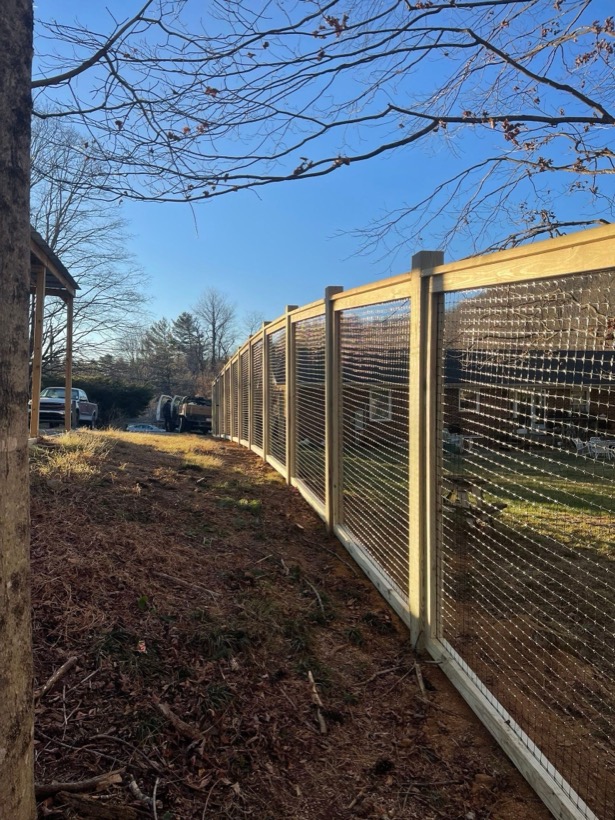 Composite Fence with Wire built by Mountain Fence & Deck in Western North Carolina